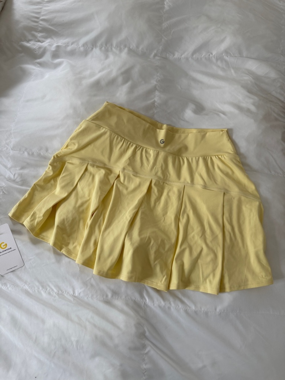 BRAND NEW Glowmode French vanilla butter Yellow Pleated Tennis Skirt size medium